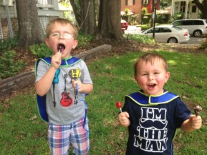 Double fisting lollipops is the birthday boy's prerogative