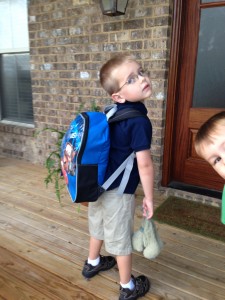 I was trying to get a coy over-the-shoulder shot of just Jack, so we could see his Cars backpack.  It turned out well, as you see.  SNORT.