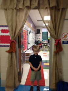 Jack in front of his Cowboy Room.  He insisted on buttoning his shirt all the way up.