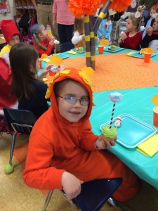 At the classroom Dr. Suess party - see the Truffula Tree decorations on the table in the background?