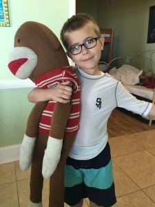 Jack was in love with this monkey, and begged that we let him keep it.  The monkey had to stay at the condo we rented, but we got to keep this picture of him.