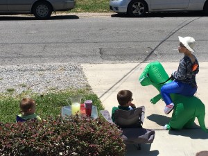 They set up a Dino-Man Lemonade stand. Sold very little. I told them $2  a glass was too steep.
