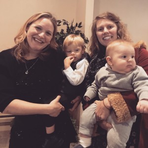 My sister holds her baby (right), our cousin holds her youngest (left)