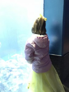 Birthday girl at Finding Nemo ride - the aquarium after.